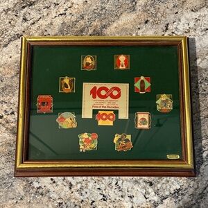 Framed Coca-Cola Pin Collection with Green Background